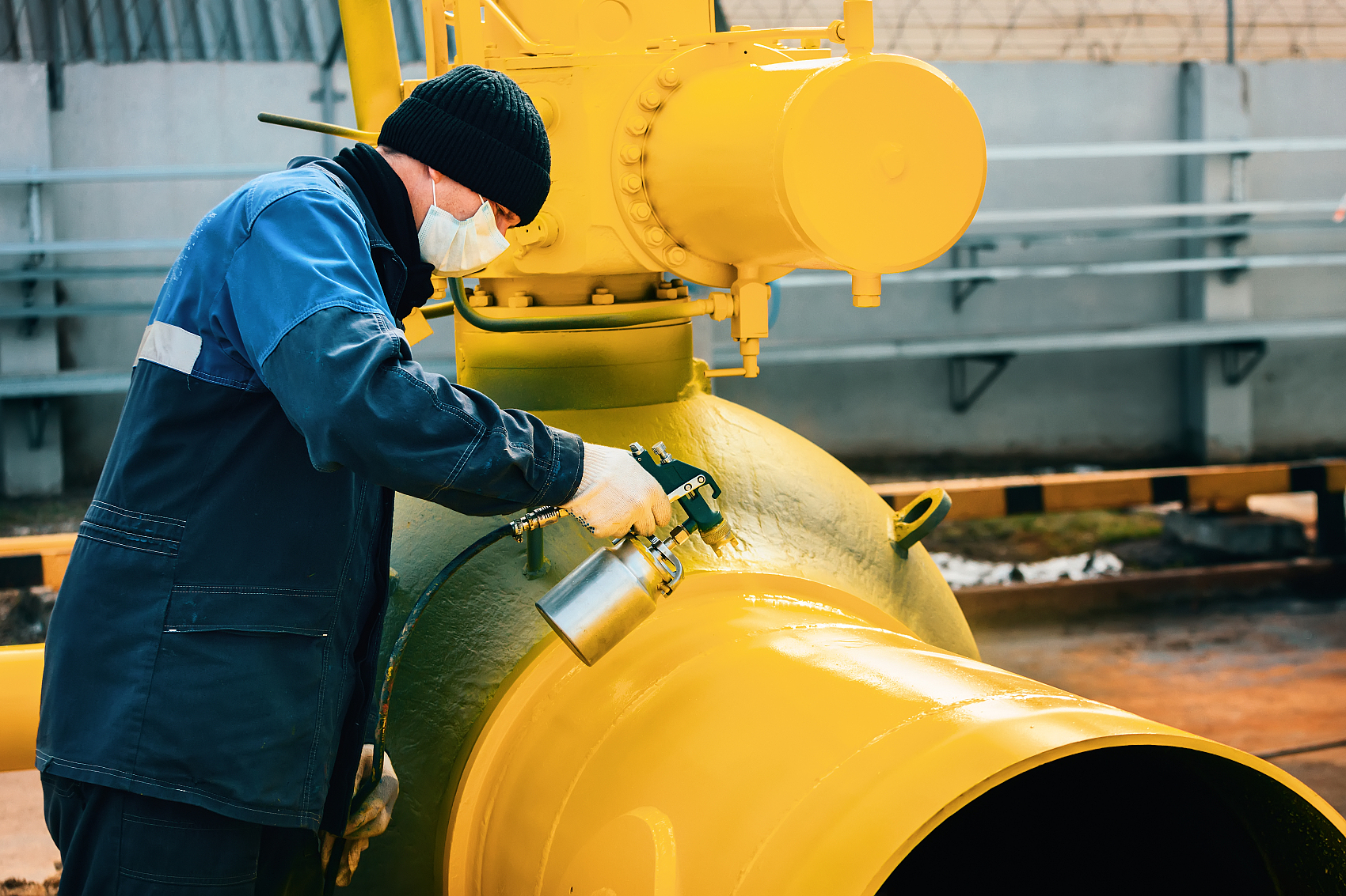 Industrial equipment protective coating application scene.