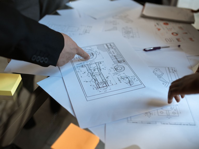 Project drawing discussion in a general engineering planning setting.